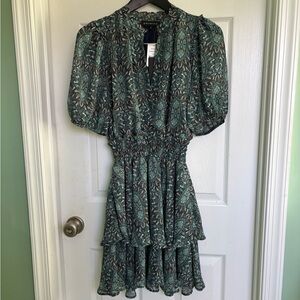 Size S Isla smocked waist bubble sleeve dress in teal green print. NWTO